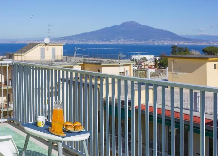 Апартаменты Super Attico Vista Mare Con Piscina